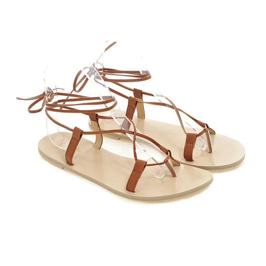 Flat cutout cross strap sandals